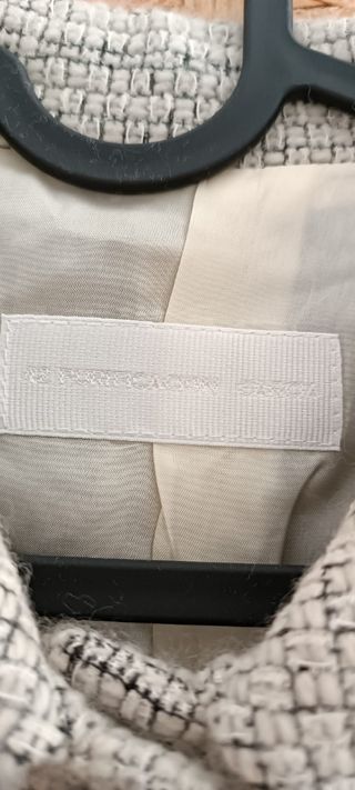 Chaqueta jaspeada blanca Purificación García 
