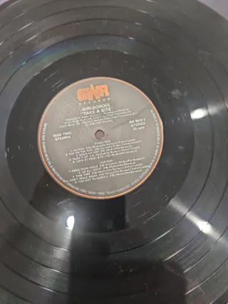 Girlschool - Take a Bite