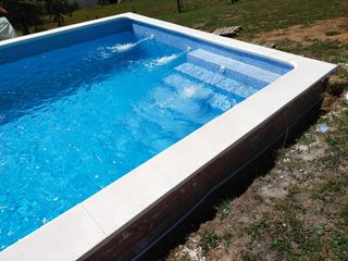 Piscinas a medida con jacuzzi/ hormigón proyectado