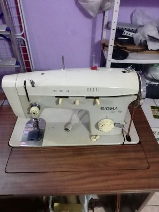Urge vender máquina de coser sigma
