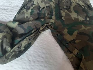 Abrigo y pantalon impermeables cazador
