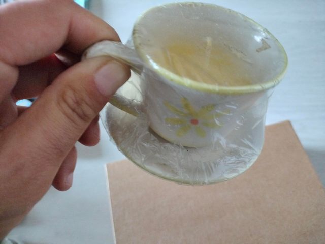 Candela nella tazzina