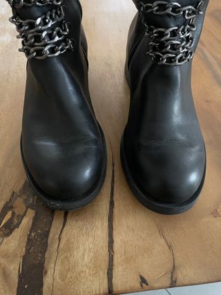 stivali neri in pelle al ginocchio