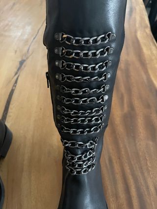 stivali neri in pelle al ginocchio