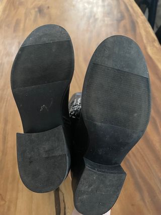 stivali neri in pelle al ginocchio