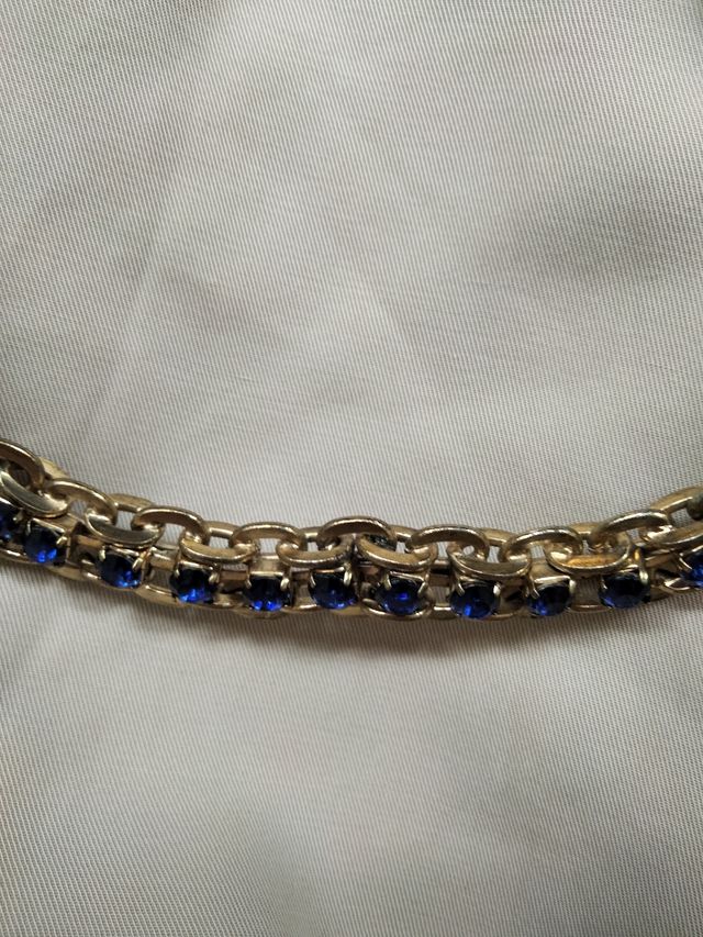 Gargantilla dorada piedra azul