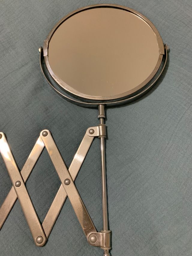 espejo articulado pared baño