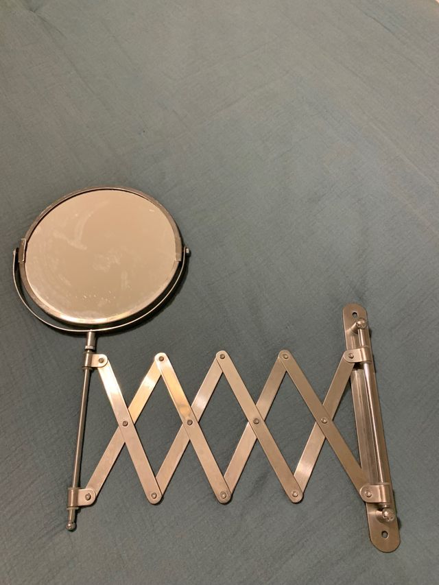 espejo articulado pared baño