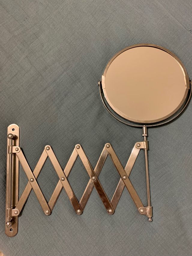 espejo articulado pared baño