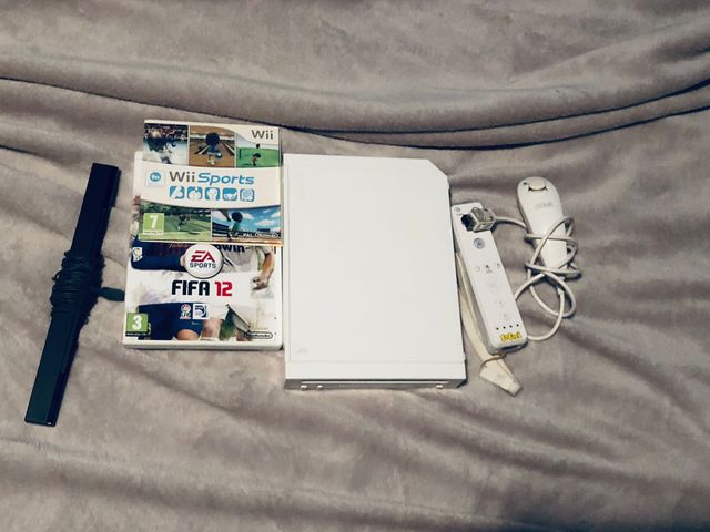 Nintendo Wii con mandos y 2 juegos