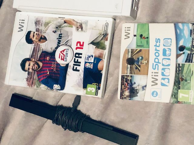 Nintendo Wii con mandos y 2 juegos