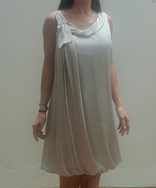 Vestido  H&M talla L blanco plateado