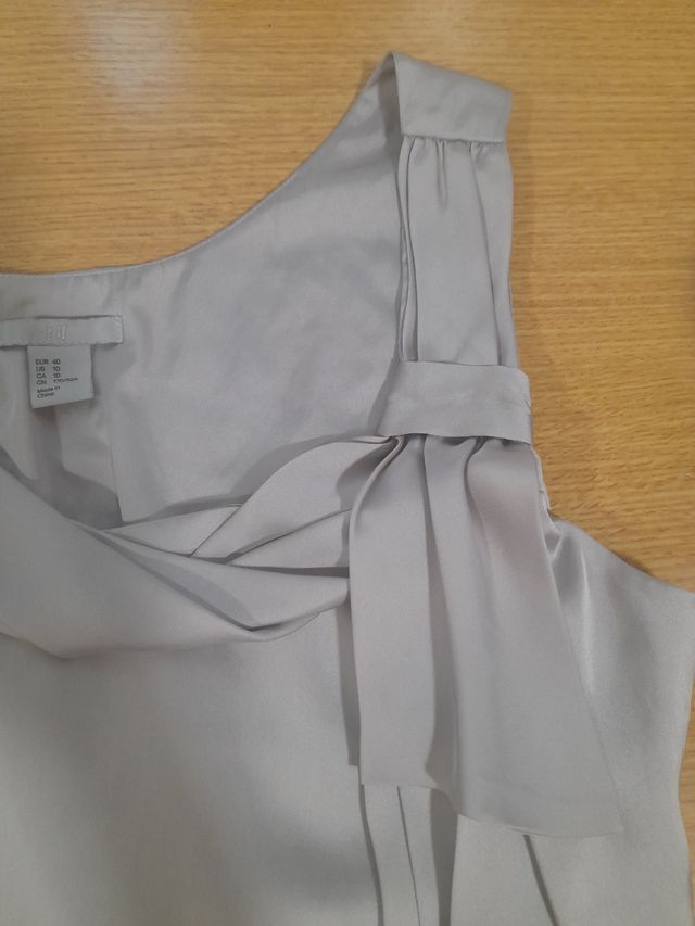 Vestido  H&M talla L blanco plateado