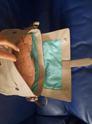Bolso de mano y para colgar . Regulable