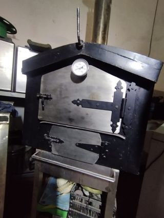 Horno de leña echo en acero inoxidable