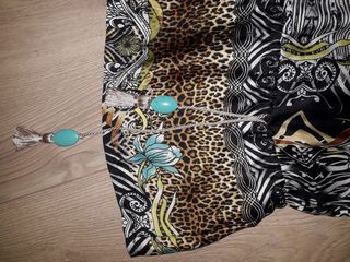 Blusa de raso con estampado print animal