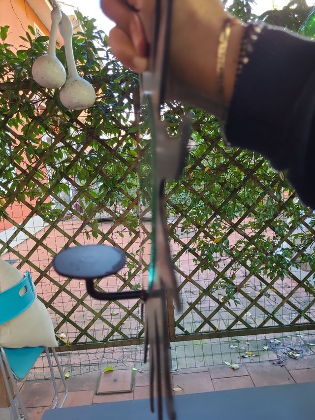 Coppia di specchi con sostegno per candelina