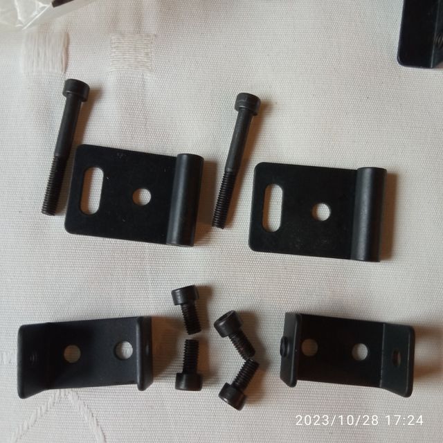 2 anclajes giratorios de pared.