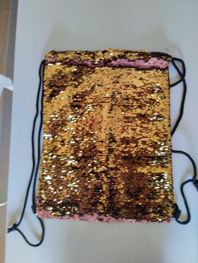 Zainetto, portamonete e cerchietto con paillettes