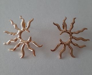 Pendientes dorados de sol