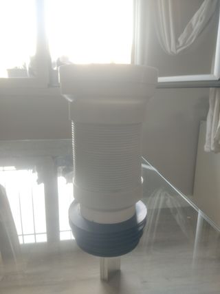 Manguito extensible wc