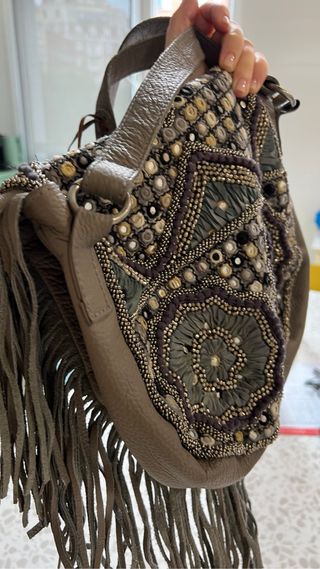 bolso piel y predreria