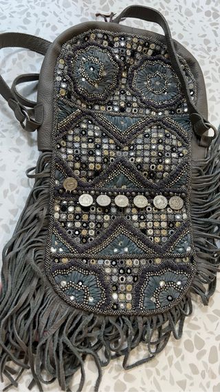 bolso piel y predreria
