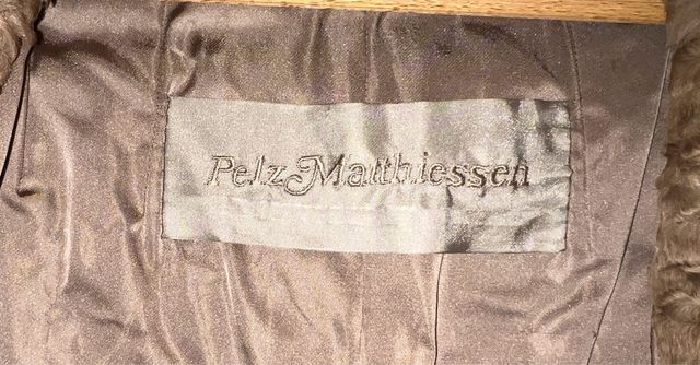 CHAQUETÓN DE PIEL ASTRACÁN