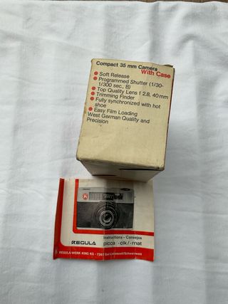 Scatola e istruzioni macchina fotografia Regula