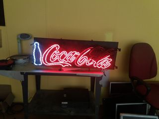 Cartel Coca-Cola de neon