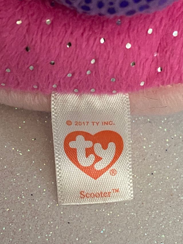 Scooter caracol de peluche Ty