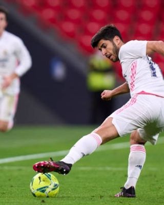 Botas Futbolista profesional Selección Española