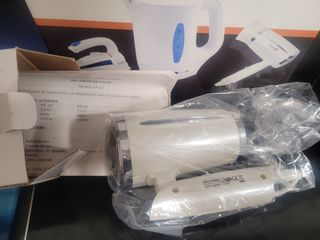 Conjunto de secador, plancha y hervidor