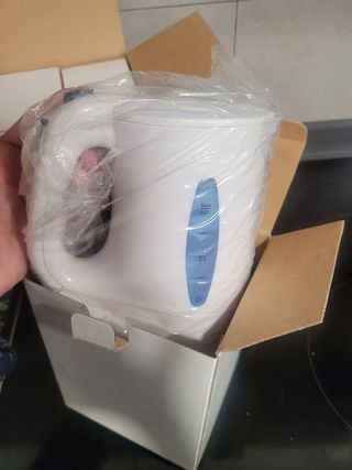 Conjunto de secador, plancha y hervidor