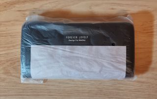 Cartera de piel acolchada,para mujer.Negra.