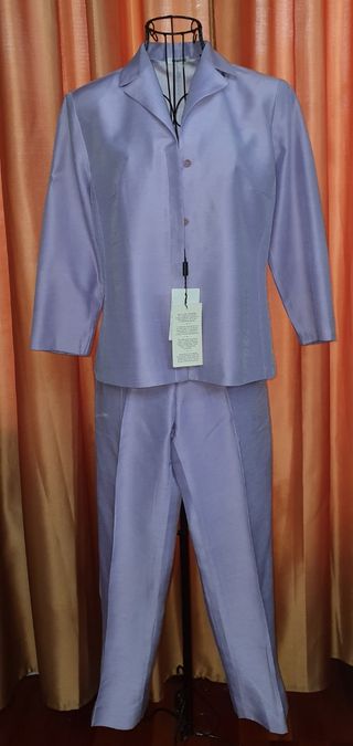 Traje tres piezas,Emanuelli
