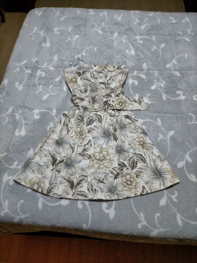 VESTIDO CON TORERA