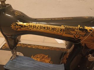 Maquina de coser singer antigua