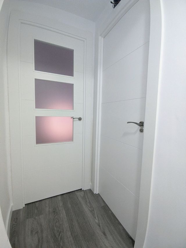 SUELO LAMINADO Y PUERTAS DE PASO
