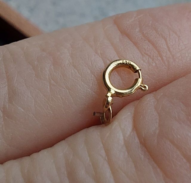 Collana  con oro giallo 750..