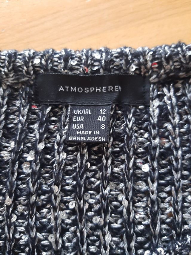 Maglione nero con paillettes 