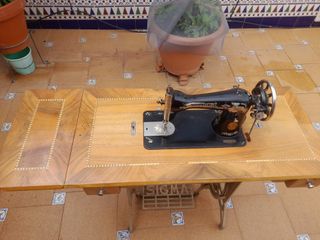 Máquina de coser antigua singer