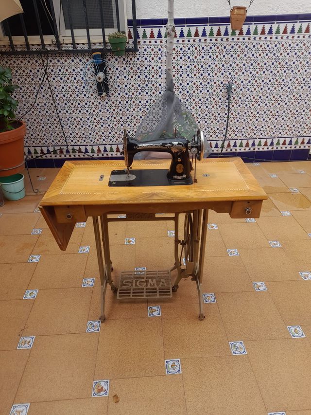 Máquina de coser antigua singer