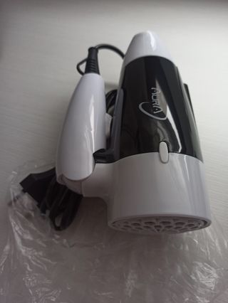 Secador de pelo de viaje nuevo, sin estrenar