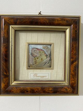 Quadri con rifiniture in argento