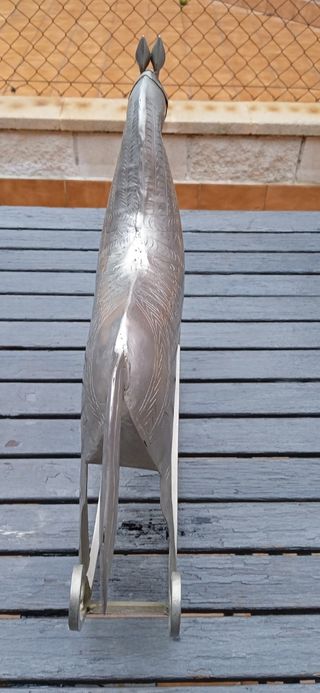 Escultura de caballo balancín alpaca cincelada.