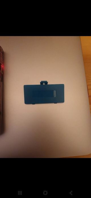 Tapa pilas game boy pocket