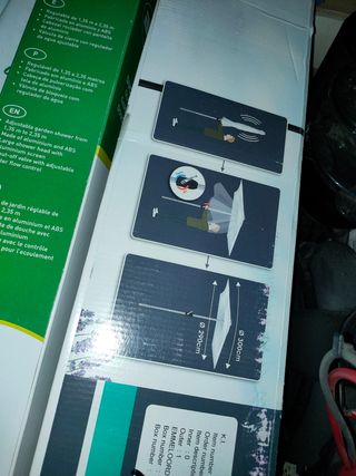 Sombrilla y pie de agua para sombrilla y ducha....