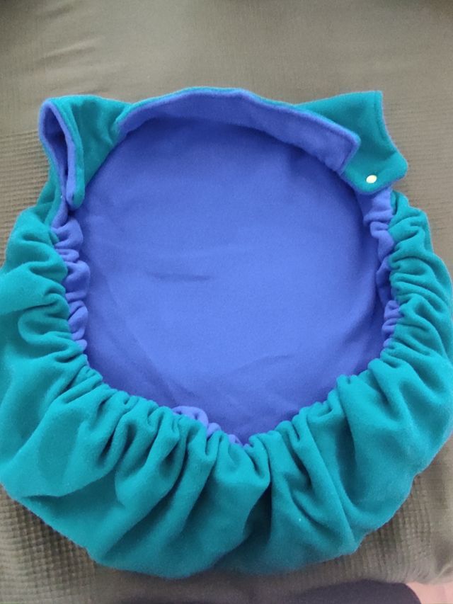 Abrigo cubre mochila de bebé