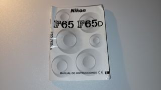 Nikon F65 + Nikkor 28-100 mm y más